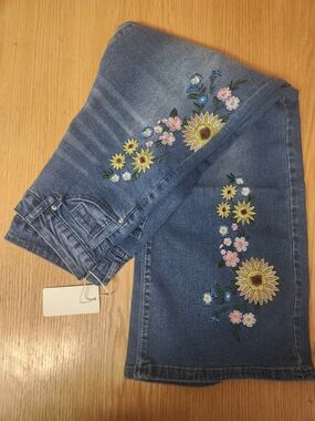 Blue Flared Jeans with Sunflower Embroidery